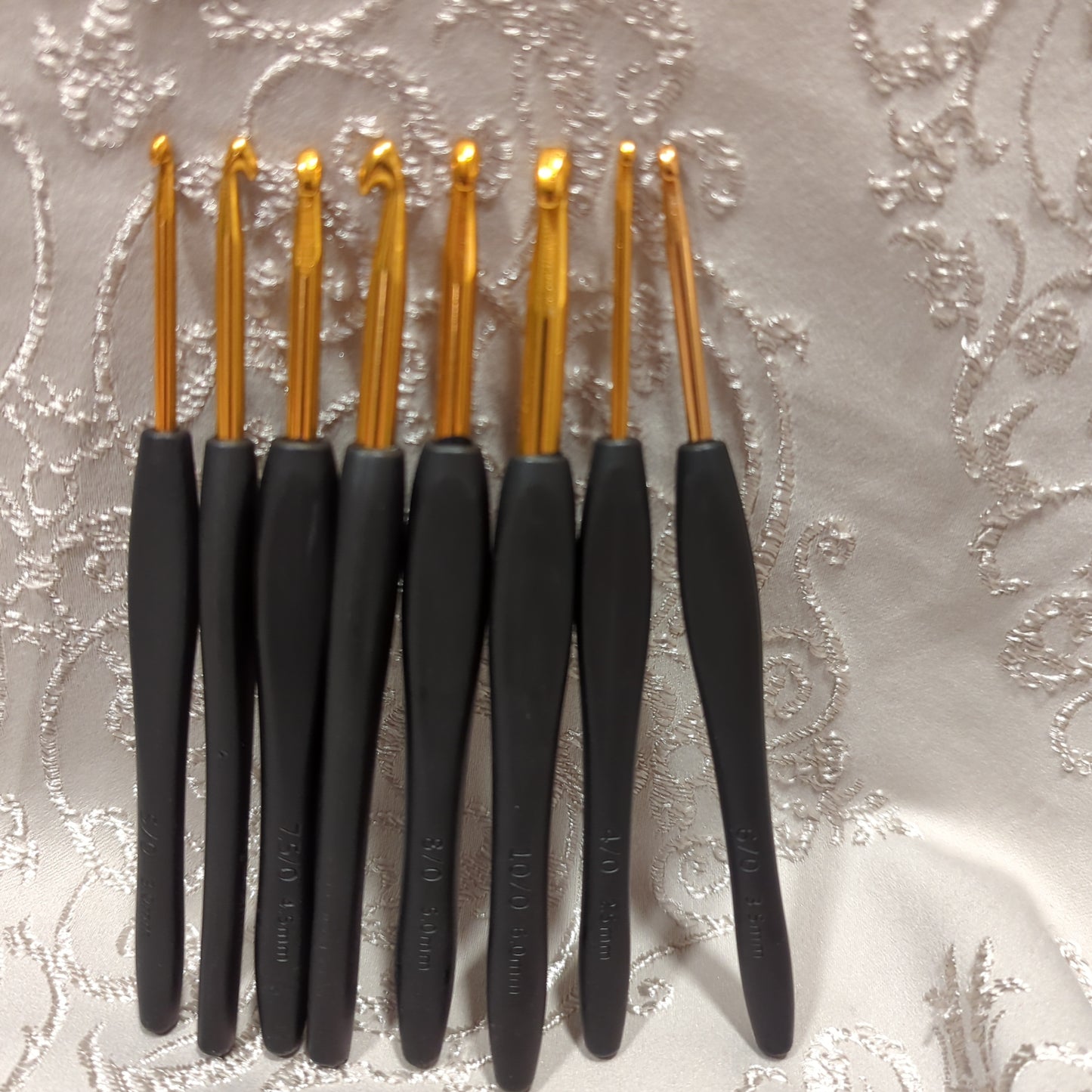 8 piece black and gold hook set