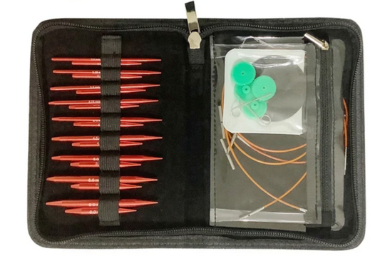 Ensemble d'aiguilles à tricoter interchangeables en métal.